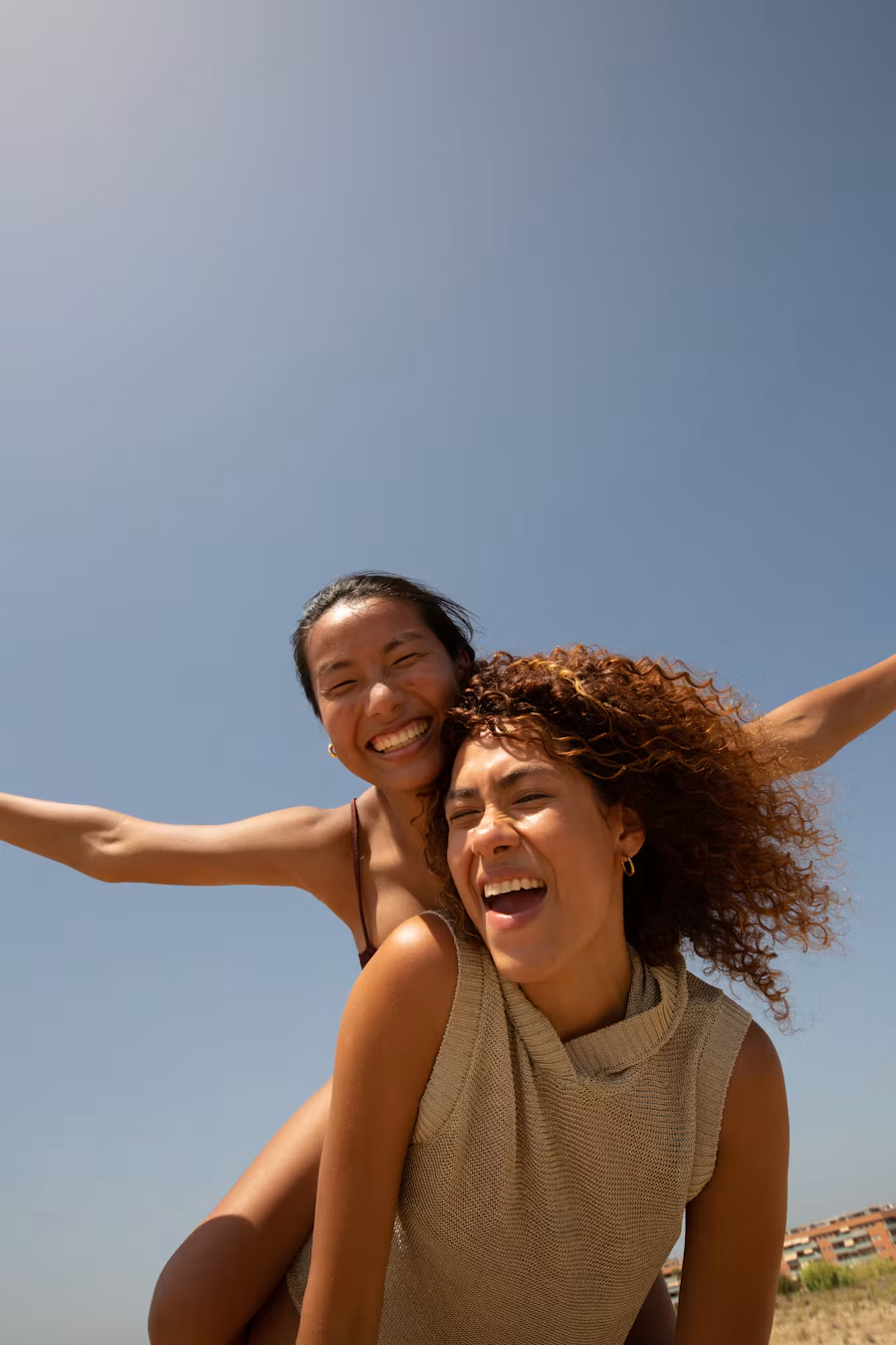 Friends laughing together outdoors
