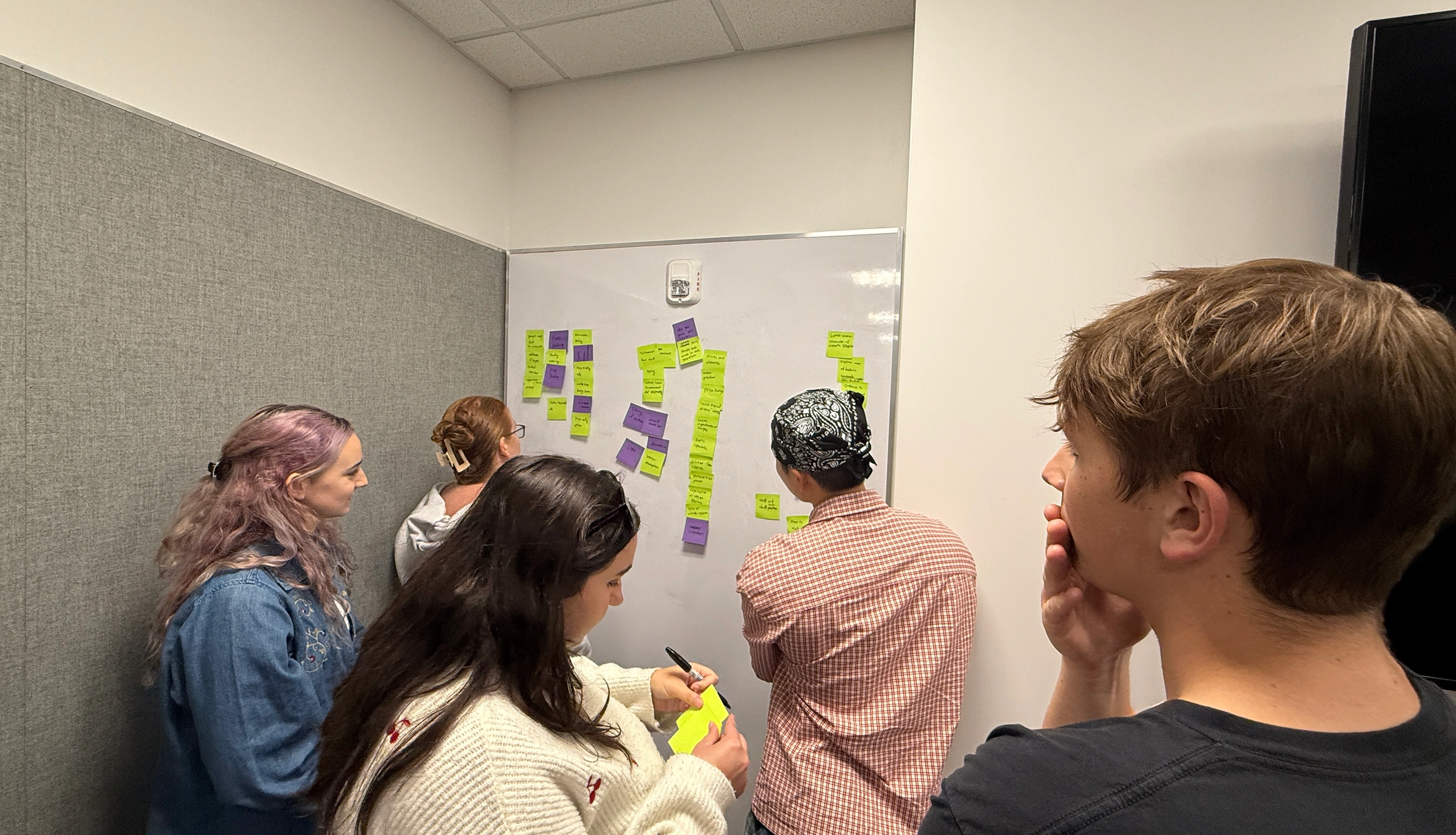 Team card-sorting artifact showing content grouped into categories